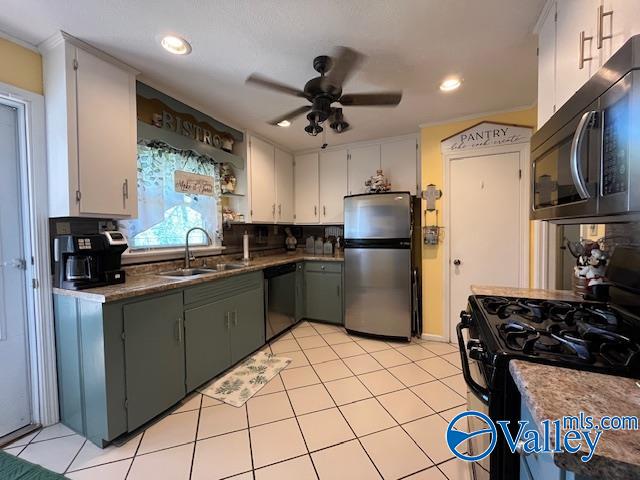 kitchen with ceiling fan, sink, white cabinets, and black appliances