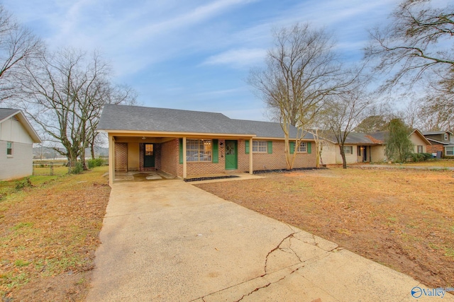 ranch-style house with a carport