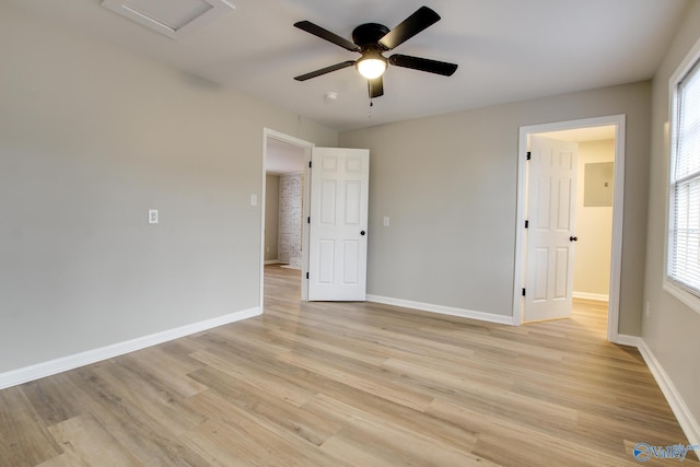 unfurnished bedroom featuring ceiling fan and light hardwood / wood-style floors