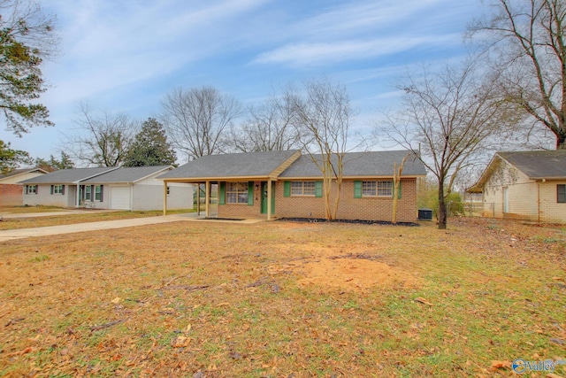 ranch-style house with a front lawn and a porch