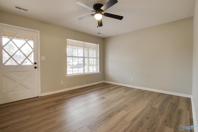 entrance foyer featuring ceiling fan and hardwood / wood-style floors