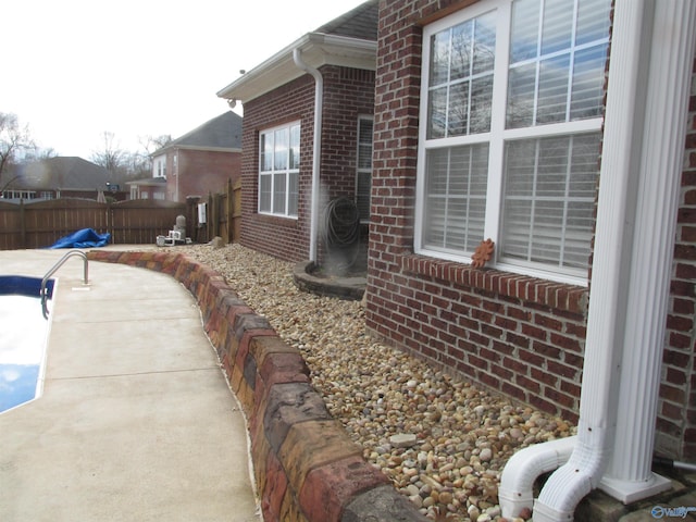 view of property exterior with a patio