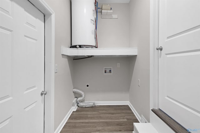 clothes washing area with electric dryer hookup, hardwood / wood-style flooring, water heater, and washer hookup