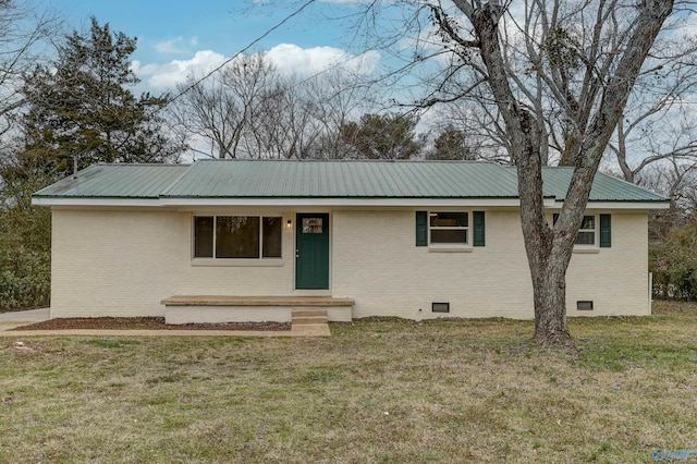 ranch-style home featuring a front yard