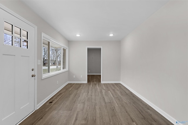 entrance foyer with light hardwood / wood-style flooring