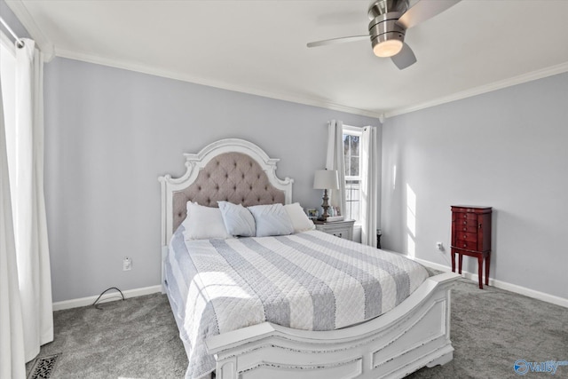 carpeted bedroom with baseboards, a ceiling fan, and crown molding