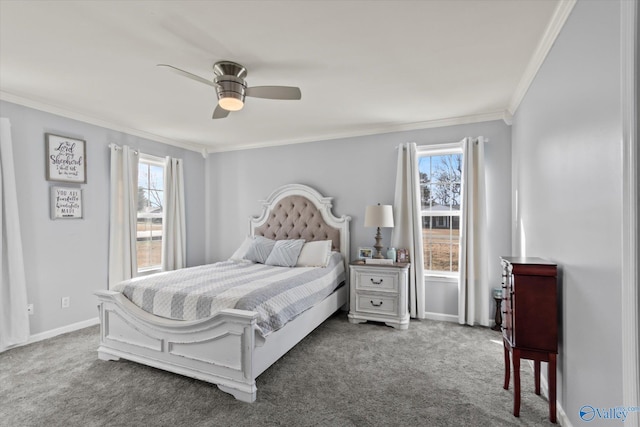 carpeted bedroom with ceiling fan, multiple windows, baseboards, and ornamental molding