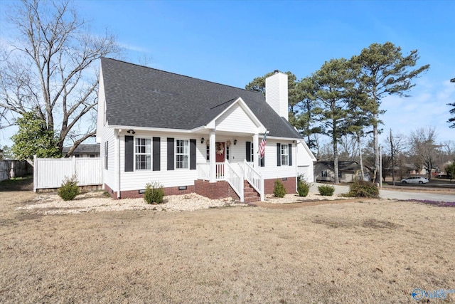 view of front of home featuring fence, a chimney, roof with shingles, and crawl space