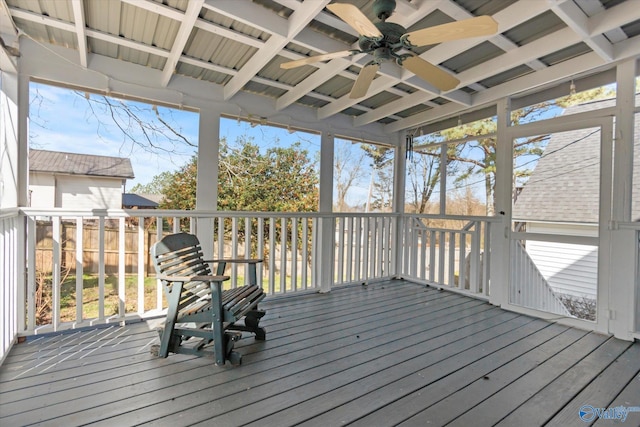 wooden deck featuring ceiling fan