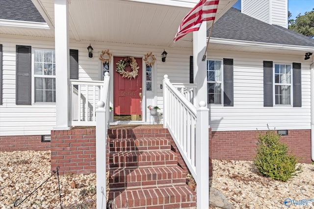 entrance to property with crawl space and roof with shingles