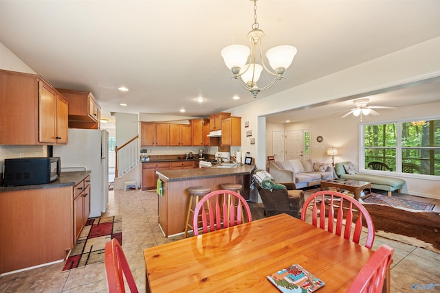 970 County Road 454, Centre, AL 35960 - dining area featuring recessed lighting, stairway, and ceiling fan with notable chandelier