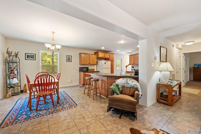 970 County Road 454, Centre, AL 35960 - dining area with a chandelier, baseboards, recessed lighting, and light tile patterned floors