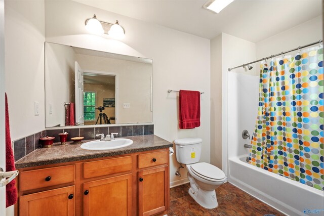 970 County Road 454, Centre, AL 35960 - bathroom with toilet, vanity, and shower / bath combo with shower curtain