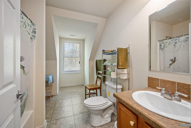 970 County Road 454, Centre, AL 35960 - full bathroom featuring tile patterned floors, toilet, visible vents, curtained shower, and vanity