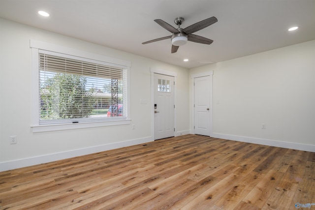 foyer featuring hardwood / wood-style flooring and ceiling fan