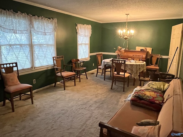 dining area featuring ornamental molding, a textured ceiling, a chandelier, and carpet flooring