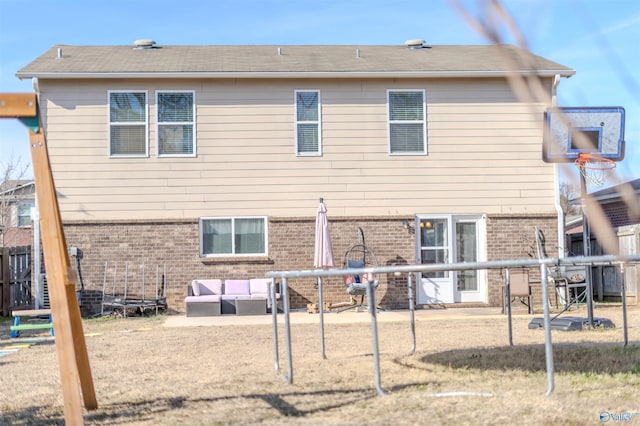 rear view of house with outdoor lounge area