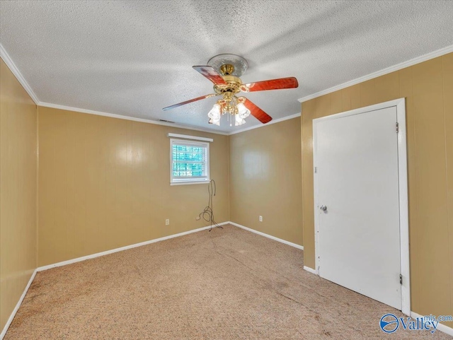 201 10th Ave NW, Decatur, AL 35601 - carpeted spare room with a ceiling fan, ornamental molding, a textured ceiling, and baseboards
