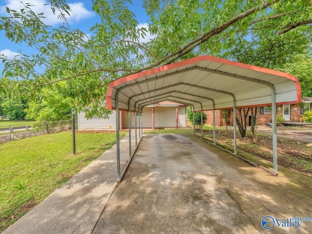 201 10th Ave NW, Decatur, AL 35601 - view of parking / parking lot featuring a carport and driveway