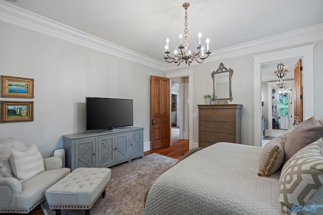 19 Ledges Main SE, Huntsville, AL 35802 - bedroom featuring a chandelier, ornamental molding, wood finished floors, and baseboards