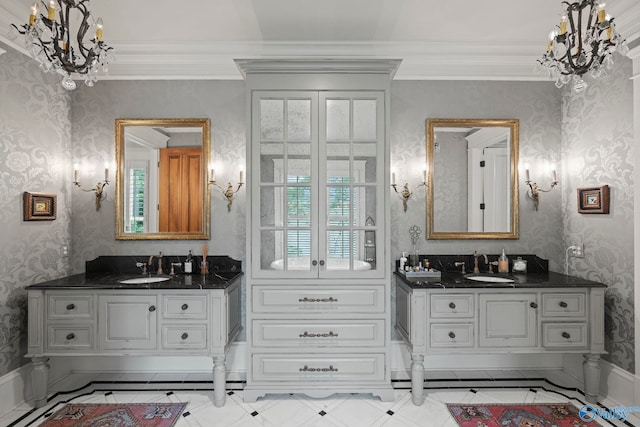 19 Ledges Main SE, Huntsville, AL 35802 - bathroom with wallpapered walls, two vanities, a chandelier, crown molding, and inlaid floor details
