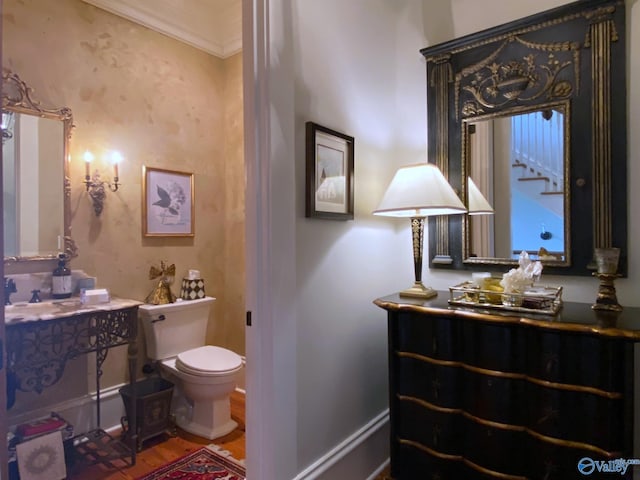 19 Ledges Main SE, Huntsville, AL 35802 - bathroom with toilet, wood finished floors, vanity, and baseboards