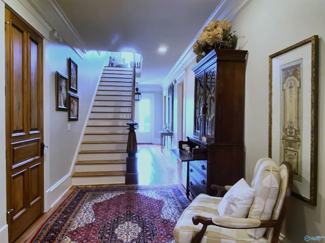 19 Ledges Main SE, Huntsville, AL 35802 - foyer with crown molding, stairs, wood finished floors, and baseboards