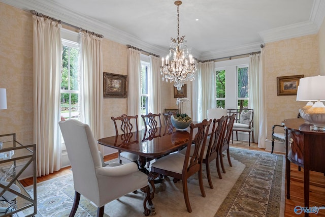 19 Ledges Main SE, Huntsville, AL 35802 - dining area with wallpapered walls, light wood-type flooring, a chandelier, plenty of natural light, and crown molding