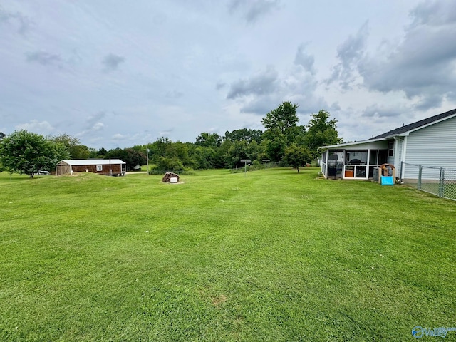 28035 Holland Gin Rd, Elkmont, AL 35620 - view of yard featuring a sunroom