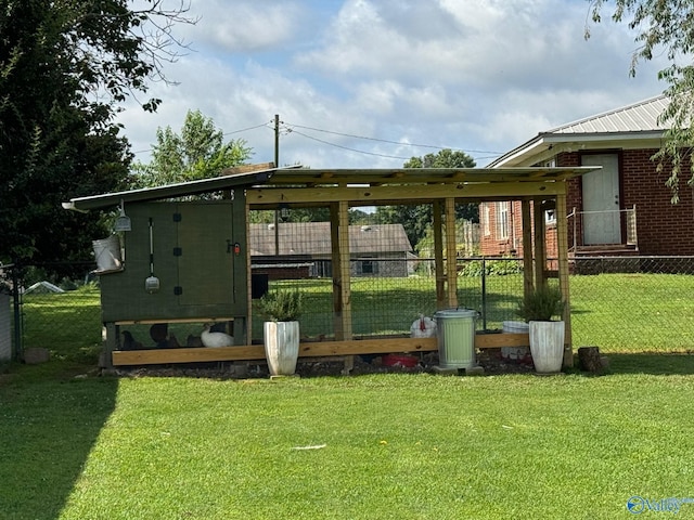 28035 Holland Gin Rd, Elkmont, AL 35620 - view of yard featuring exterior structure and an outdoor structure