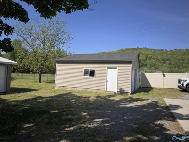 garage with fence