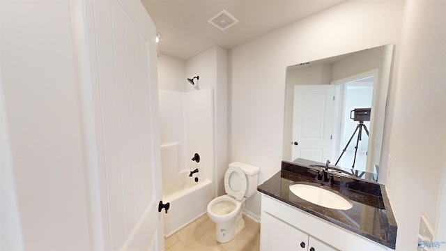 full bathroom with tile patterned floors, vanity, toilet, and  shower combination