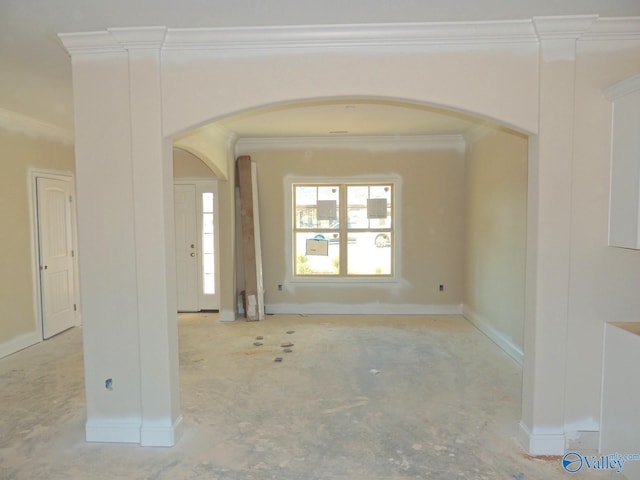 interior space with crown molding