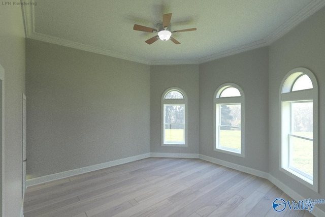 empty room featuring ceiling fan, a healthy amount of sunlight, ornamental molding, and light hardwood / wood-style flooring