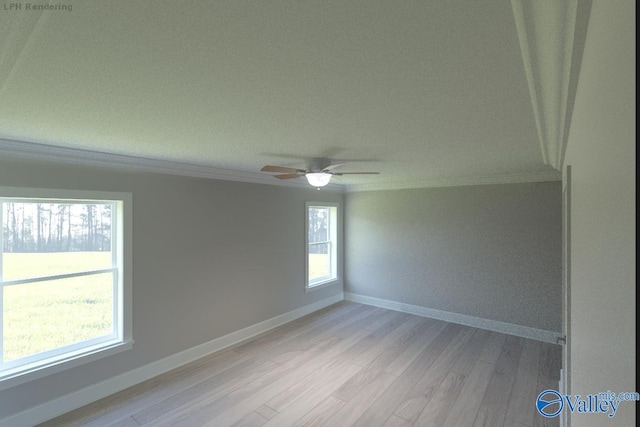 spare room featuring ceiling fan, crown molding, and light wood-type flooring