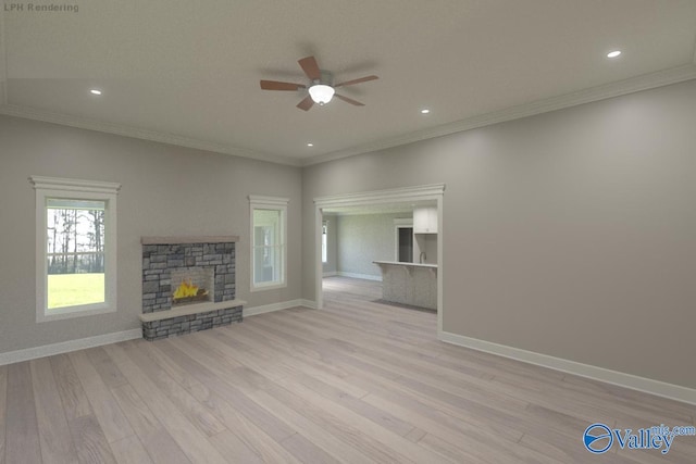 unfurnished living room with ornamental molding, a fireplace, and light hardwood / wood-style flooring