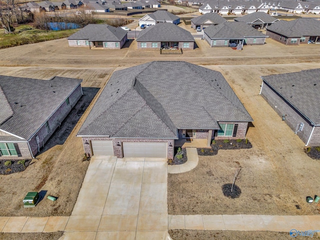 drone / aerial view featuring a residential view