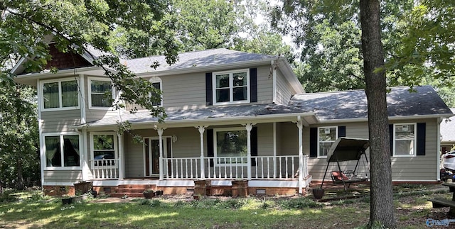 10466 Segers Rd, Madison, AL 35756 - view of front facade with covered porch, crawl space, and roof with shingles