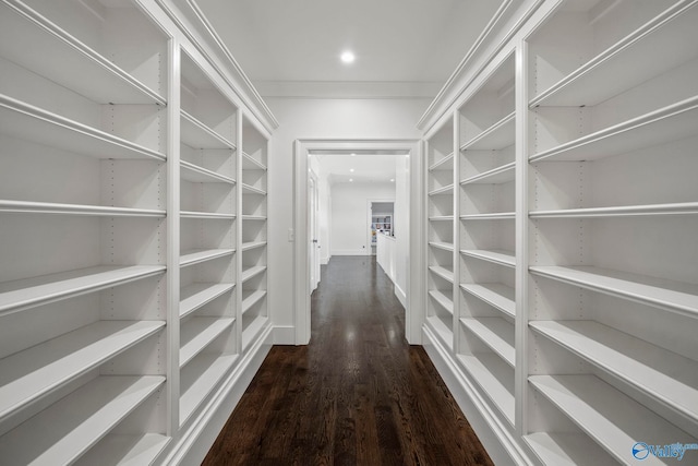 interior space with recessed lighting, dark wood-type flooring, and baseboards