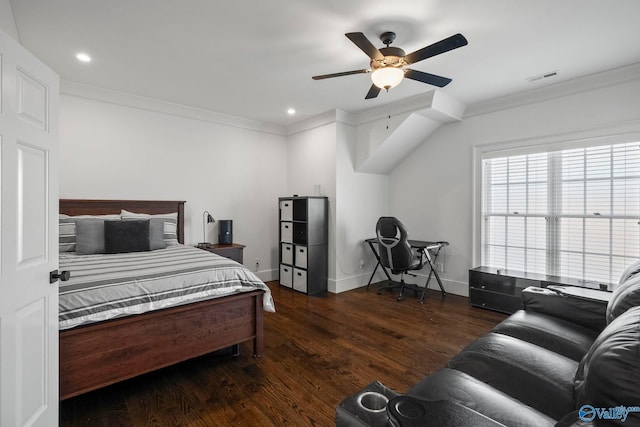 bedroom featuring wood finished floors, visible vents, baseboards, recessed lighting, and crown molding