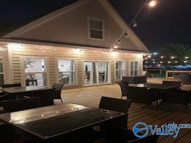 view of deck at twilight