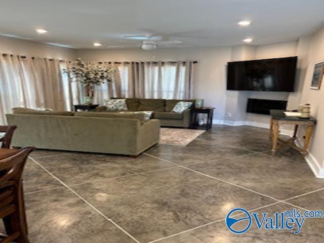 living room featuring ceiling fan