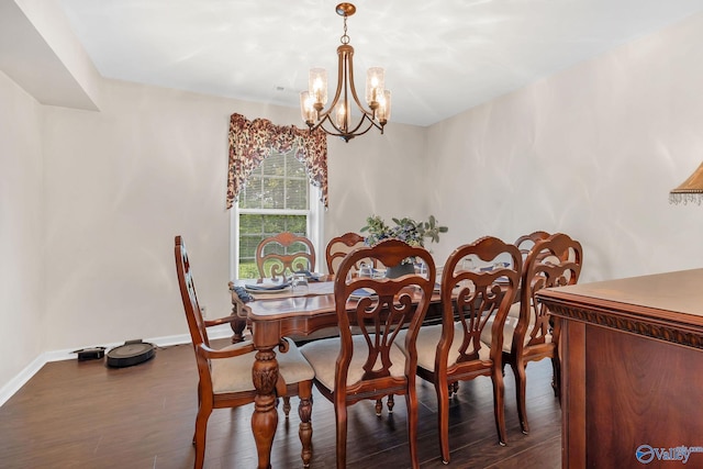 152 Old Vaughn Bridge Rd, Hartselle, AL 35640 - dining area featuring a chandelier, dark wood-type flooring, and baseboards