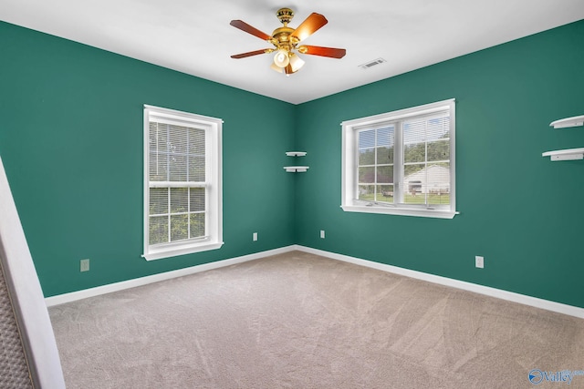 152 Old Vaughn Bridge Rd, Hartselle, AL 35640 - carpeted spare room featuring a ceiling fan and baseboards