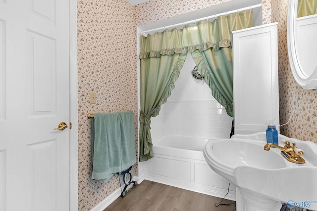 152 Old Vaughn Bridge Rd, Hartselle, AL 35640 - bathroom featuring wallpapered walls, wood finished floors, baseboards, and a sink