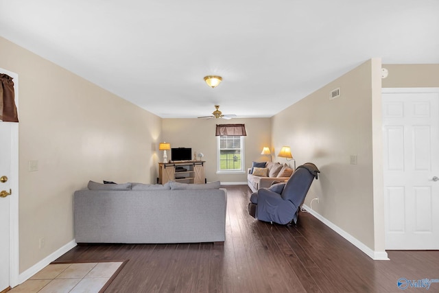 152 Old Vaughn Bridge Rd, Hartselle, AL 35640 - living room featuring ceiling fan, wood finished floors, and baseboards
