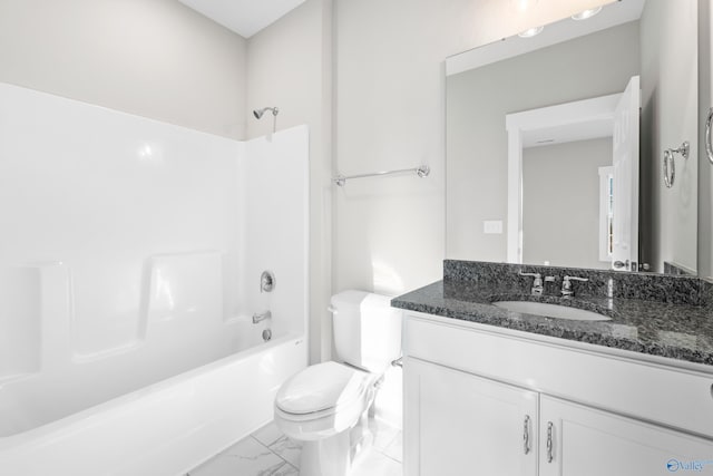 bathroom with toilet, marble finish floor, bathtub / shower combination, and vanity