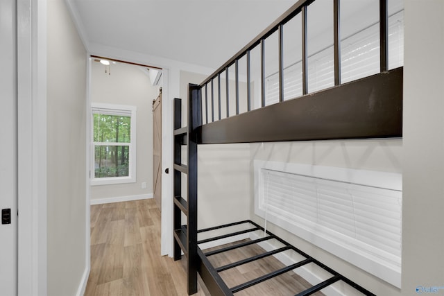 568 County Road 642, Mentone, AL 35984 - unfurnished bedroom featuring wood finished floors and baseboards