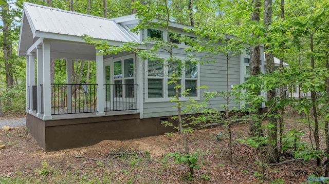 568 County Road 642, Mentone, AL 35984 - back of property with metal roof and covered porch