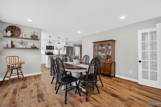 2605 Ready Section Rd, Toney, AL 35773 - dining area with light wood-style flooring and recessed lighting